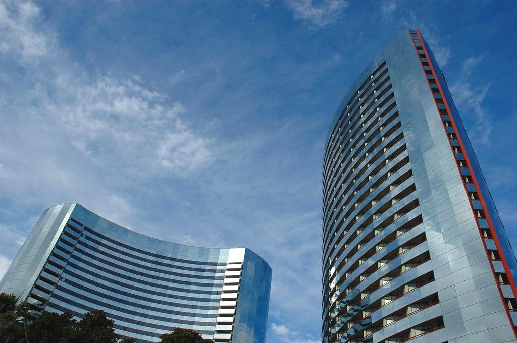 Customer support representative with headset in a modern cloud office environment